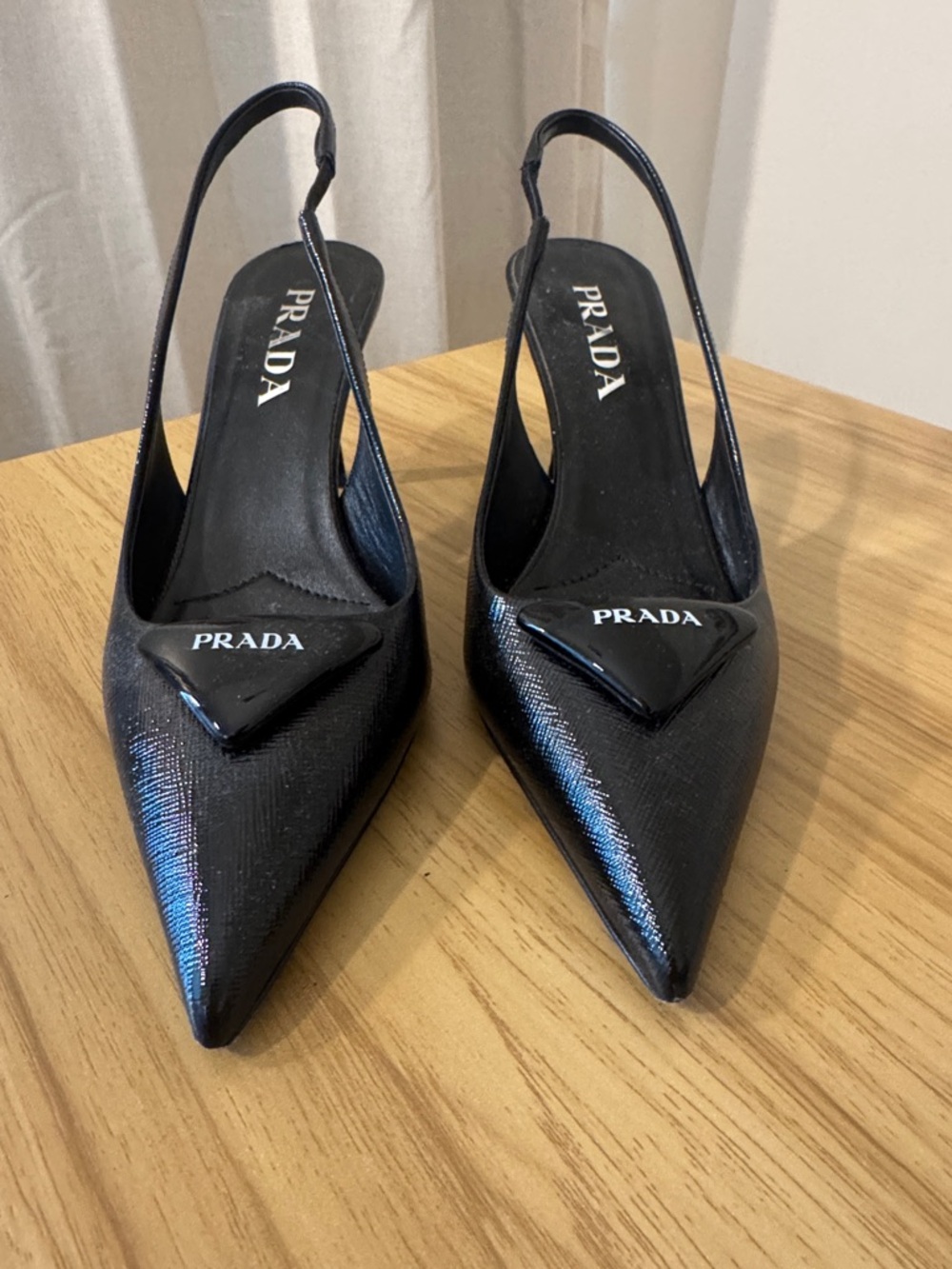 Prada Black Pointed Slingback Pumps with Logo Plaque